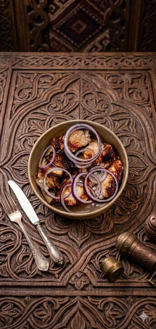Grilled mtsvadi served with red onion